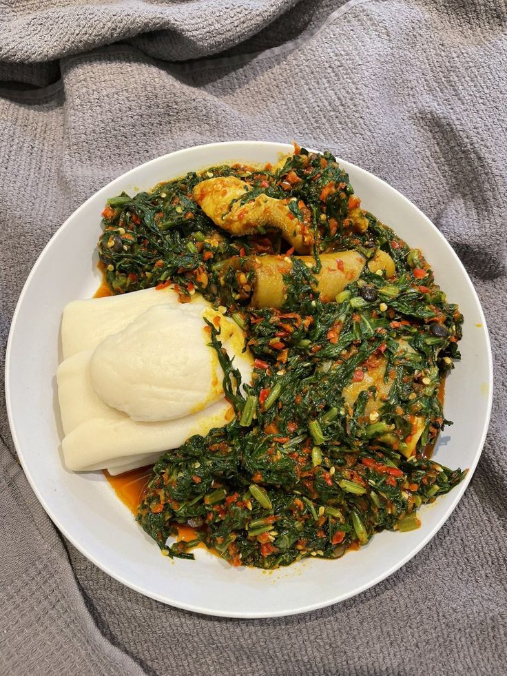 Boiled Yam with Leafy Vegetable Sauce